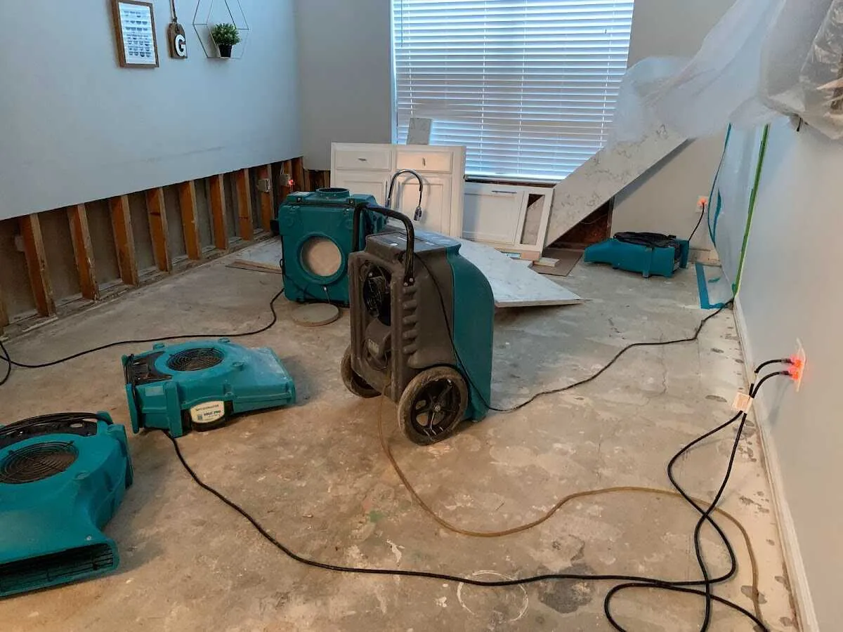 Dehumidifier in flood-cut room for Water Damage Restoration in Langley Park